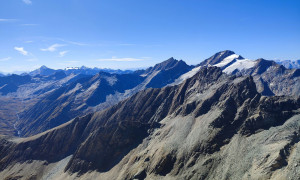 Bergtour Quirl - Gipfelsieg, mit Blick zur Rieserfernergruppe, Daberspitze und Rötspitze